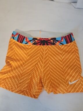 Nike Women's Orange Geometric Athletic Shorts with Multicolor Waistband